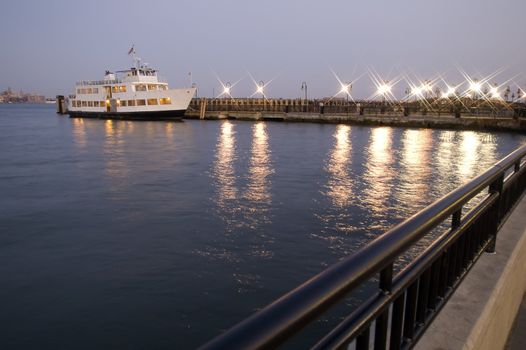 white boat docking at new jersey port,