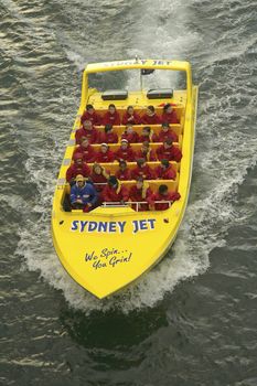 yellow Sydney jet with people, big attraction on Circular Quay
