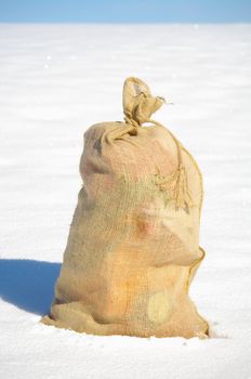 A bag from Santa Claus in a snowy landscape