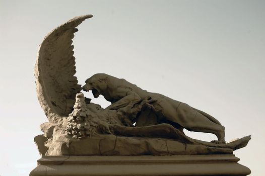 Chimera on the roof of house in city Kyiv. Ukraine.