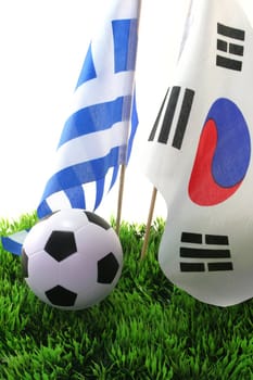 Flags with leather ball on a white background