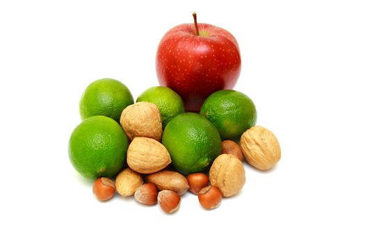 Green laime with nuts, apple isolated on white