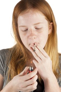 young girl is smoking pot isolated on white