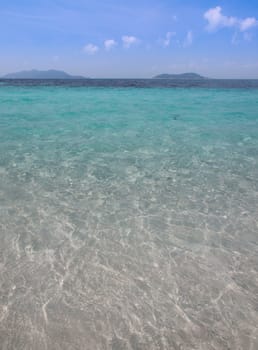 Beautiful seascape at Rawa Island Malaysia with islands in the background