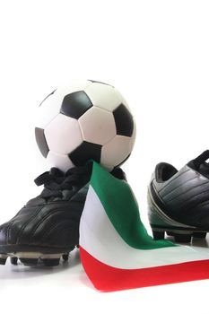 flag of Italy with soccer shoes and football