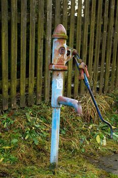 Countryside old water pump in central european country