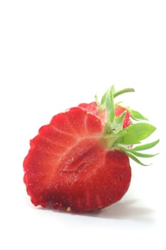 fresh strawberry half on a white background