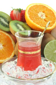 Fruit iced tea with fresh fruit and ice cubes