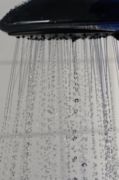 water drops falling from a shower indoors