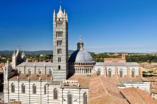 Cathedral and bell tower of Tuscan city Sienna (Duomo di Siena)