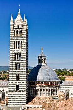 Cathedral and bell tower of Tuscan city Sienna (Duomo di Siena)