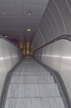 Escalator stairs to an underground station or supermarket