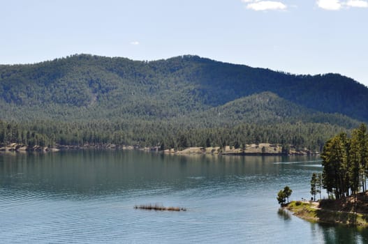 Black hills and water background