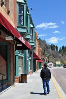 Deadwood man walk along lucky nugget