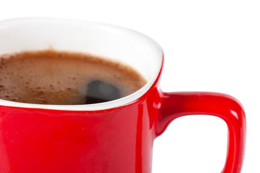 A red cup of coffee isolated over white background