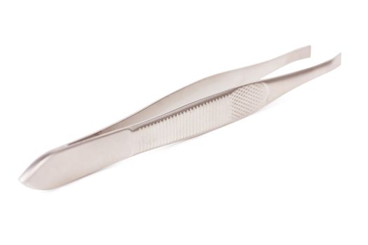 Macro view of tweezers isolated over white