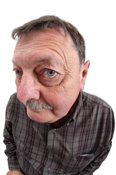 Photo of a man in his sixties using a fisheye lens to exaggerate his features.
