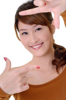 Asian beauty make frame by hands with happy smiling face.