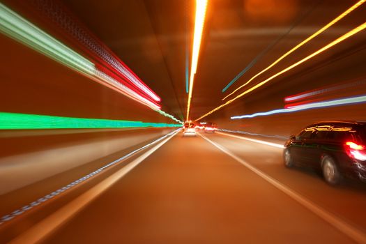 tunnel car motion blur night traffic fast