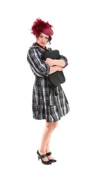 The woman with a bag in a ladies' hat isolated on white background