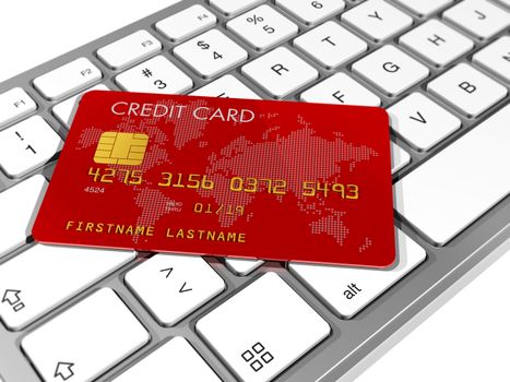 Red credit card on a computer keyboard