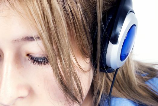 Young girl listening to music being in depression