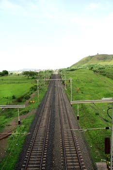 Railway tracks in the Indian countryside.