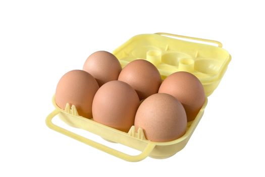 six eggs in a yellow plastic eggbox