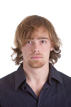 Goodlooking young caucasian man with half long hair on white background