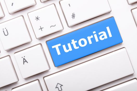 tutorial key with word showing internet or online software education concept