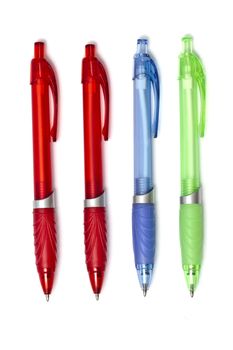Colorful ball point pens isolated on white background