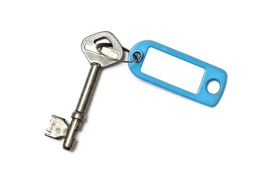 Blank tag and old key isolated on white background 
