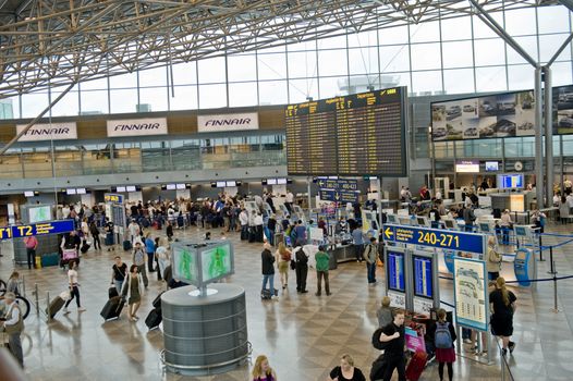 Check-n  aboard the plane in Helsinki Airport Vantaa