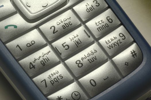 Mobile cell telephone buttons with Arabic symbols