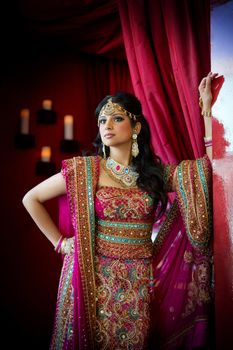 Image of a beautiful Indian bride standing