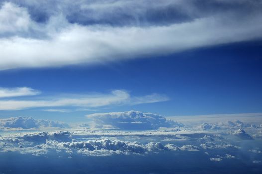 Aerial view of a thunderhead in a peaceful sky
