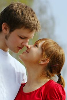 young man and woman kissing