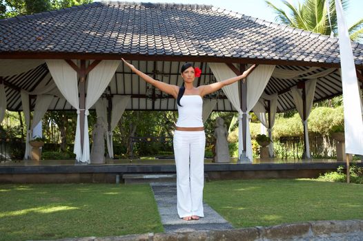 20-25 years woman portrait during yoga at exotic surrounding, bali indonesia