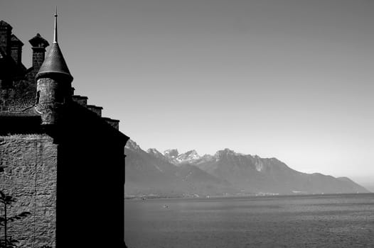 Combination of the view of a castle with Lake Geneva.