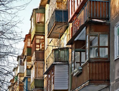 part of a wall of a building with a number of balconies