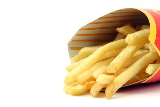 french fries in box detail on white backround food concepts