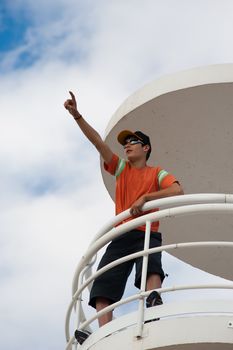 Lifeguard on duty on top of a watch-tower