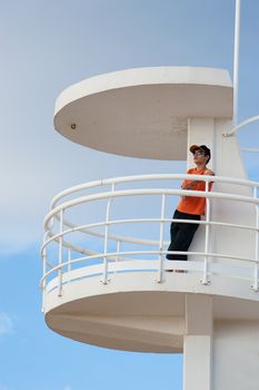 Lifeguard on duty on top of a watch-tower