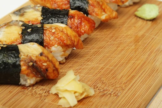 Close up photo of broiled eel (unagi) sushi