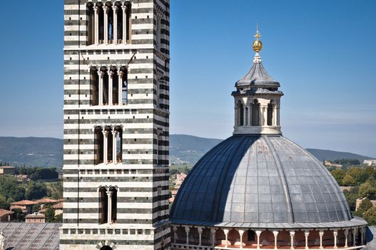 Cathedral and bell tower of Tuscan city Sienna (Duomo di Siena)