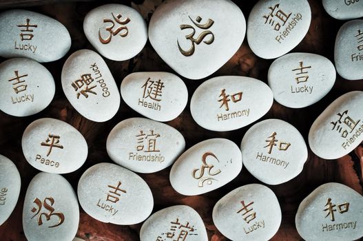 Fortune stones with carved symbols
