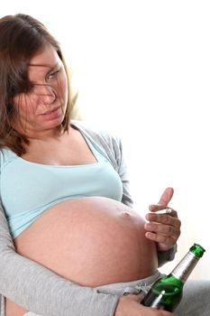 pregnant woman takes drugs - She drinks beer and smokes and gets drunk
