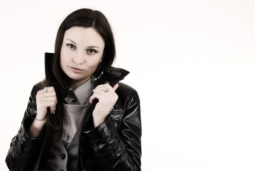 young girl in leather jacket  isolated on white