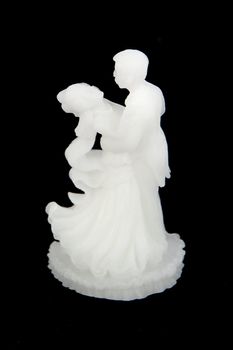 a white bride and groom on black