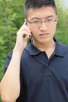 chinese man talking phone and worry